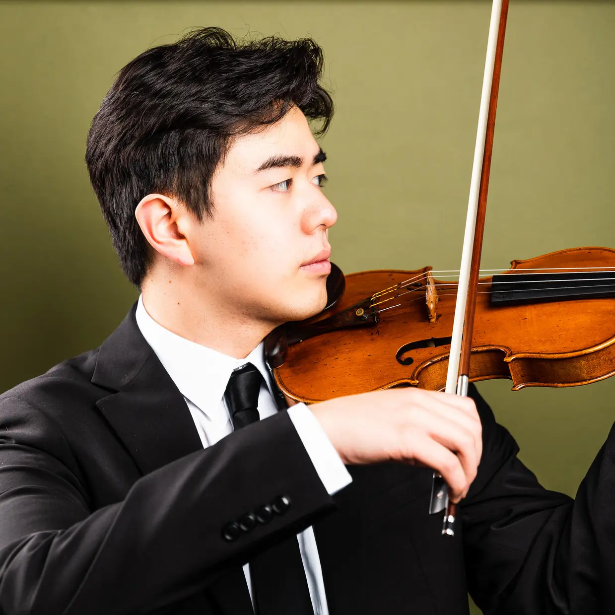 Steven headshot playing violin -.jpg