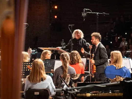 Maestro Marek Pijarowski, Radosław Pujanek, concertmaster and the Academic Symphony Orchestra