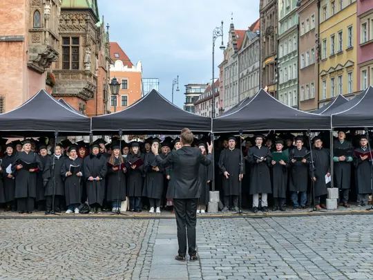 The combined academic choirs of Wrocław under the direction of Dominik Jarocki