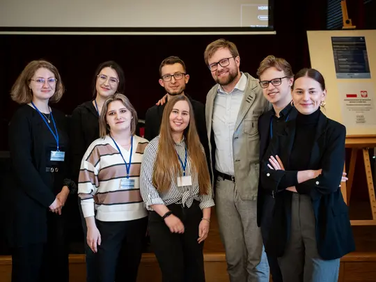 Volunteers and the scientific and organizational director of the conference, Dr. Miłosz Kula