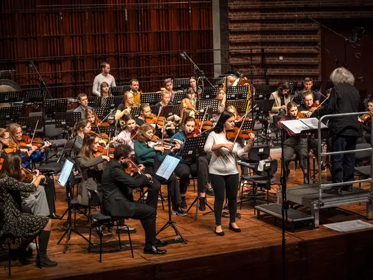 Maestro Marek Pijarowski, Sara Dragan and the Academic Symphony Orchestra