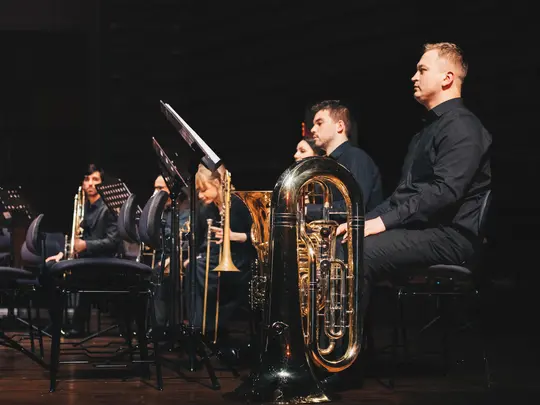 Tubas and trombones section of the Academic Wind Orchestra